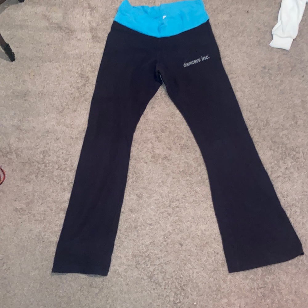 Black and blue bell bottom leggings